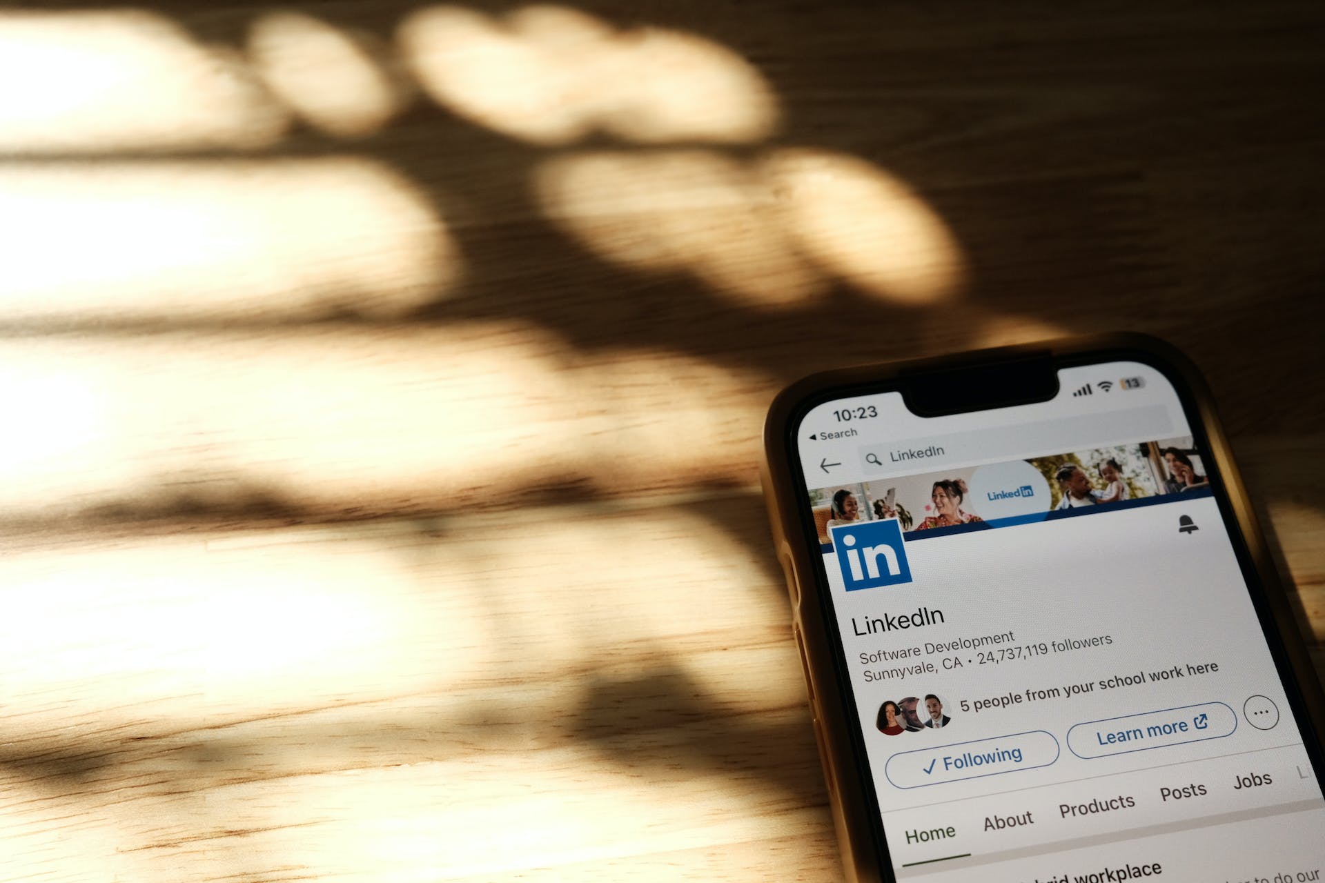 Start Making an Impact with LinkedIn phone with LinkedIn app